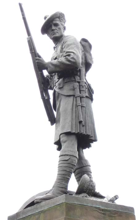 A Gordon Highlander loads his rifle in readiness for action
