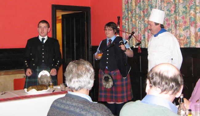 Piper and chef enjoy a dram